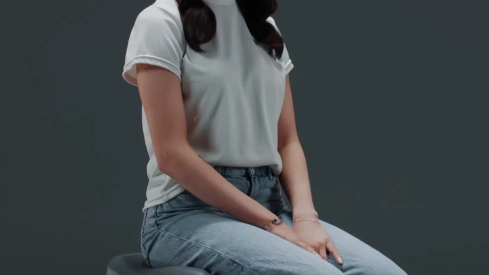 woman sitting in dopamine chair