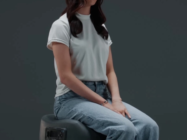 woman sitting in dopamine chair